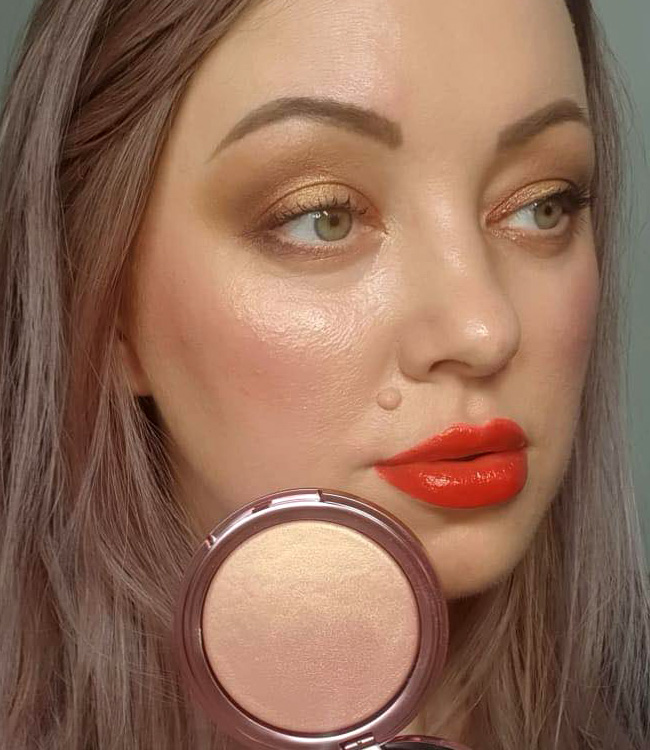 Pat McGrath Divine Rose Ultra Glow Highlighter Makeup on the cheeks